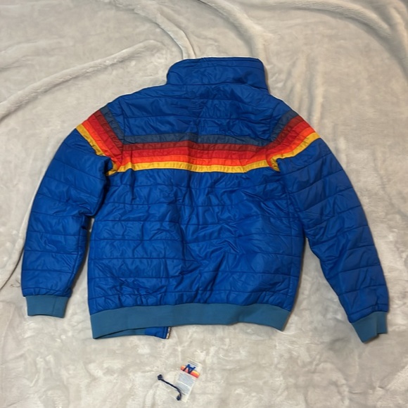 Jacket is Blue with a rainbow going across the chest. It is a Children’s size L. - Picture 3 of 4
